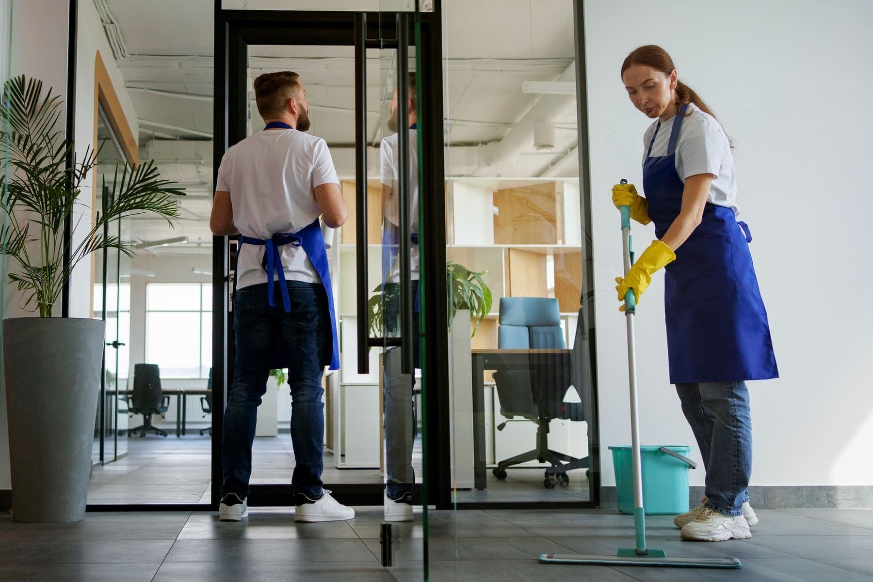 Commercial cleaning technician cleaning an office workspace in Dublin
